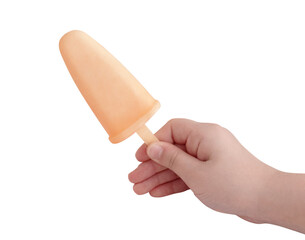 Ice cream from tangerines in a child's hand on a white background