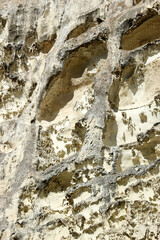 old caves in limestone cliffs in Crimea