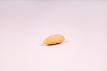 peeled almonds in the center of the frame