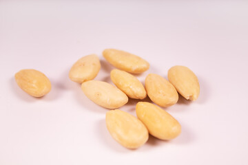 nine peeled almonds in the center of the frame