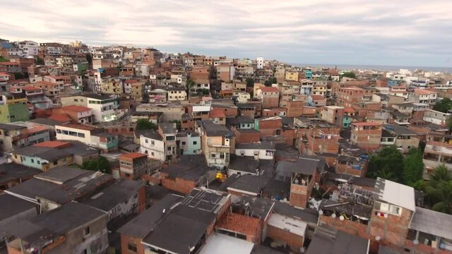 Favela drone image at sunset, hilltop in Brazil