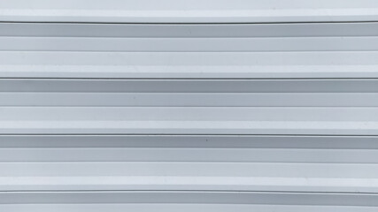 horizontal repeating lines in four shades of gray