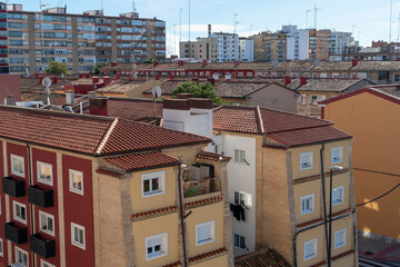 top view of the roofs of old and humble rehabilitated buildings in the Picarral area of zaragoza, Spain.