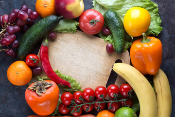 An assortment of fresh vegetables and fruits on the table. Healthy eating. Food backgrounds: table filled with large variety of food.