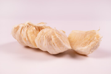 side view of a half of a manadrinka divided into slices in the form of a snake