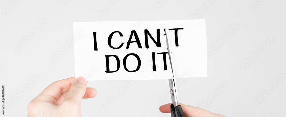 Poster man using scissors to remove the word can't to read i can do it concept for self belief, positive at