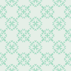 Vector geometric seamless pattern in ethnic style. Simple abstract ornamental background with grid, mesh, floral shapes, crosses, rhombuses. Elegant texture in turquoise green color. Repeat design