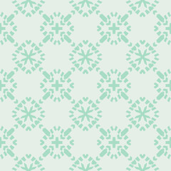 Vector geometric seamless pattern in ethnic style. Simple abstract ornamental background with grid, mesh, floral shapes, crosses, rhombuses. Elegant texture in turquoise green color. Repeat design