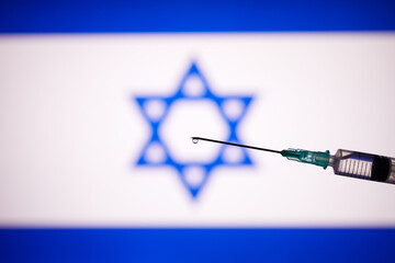 Syringe or vaccine with Israel flag in background.