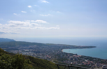 Picturesque view from the mountain to the sea and the city