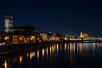 Magdeburg at night with reflections