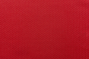 a piece of red cloth. fabric texture for background and design works of art, beautiful wrinkled pattern of silk or linen