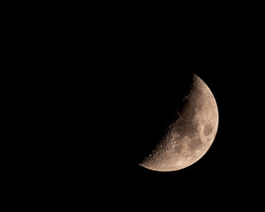 Half crescent moon in the night sky © knowlesgallery