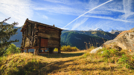 Wooden hut house in the swiss alps wallis, switzerland blue sky matterhorn alps, alpine old landscape - obrazy, fototapety, plakaty