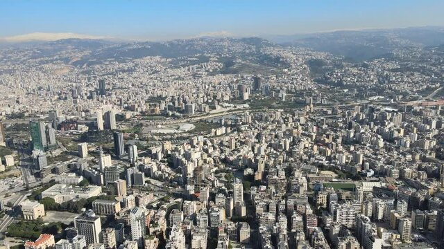 Hyperlapse drone shot over Beirut showing Beirut Port and Airport