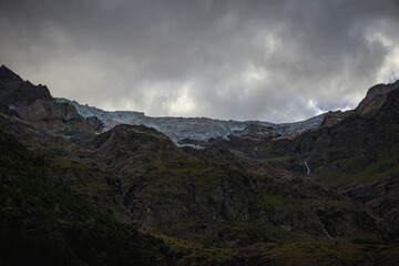 Fototapeta na wymiar glacier view with clouds and snow and ice rock