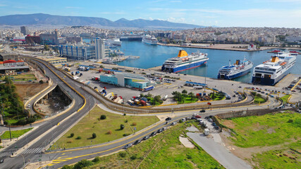 Aerial drone photo of busy port of Piraeus, the largest in Greece and one of the largest passenger ports in Europe as seen from old fertiliser factory, Attica, Greece 