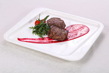 Beef steak with berry sauce