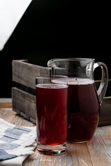 Berry compote photo on dark studio background