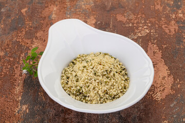Peeled hemp seeds in the bowl