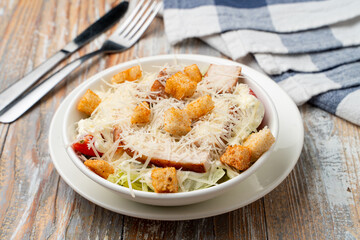 Caesar salad with chicken breast, clean light photo