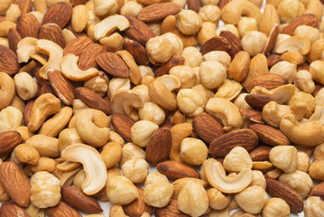 Mix of nuts isolated on white background. Top view.
