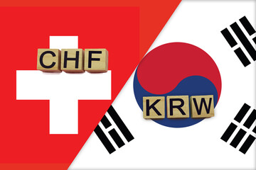 Switzerland and South Korea currencies codes on national flags background