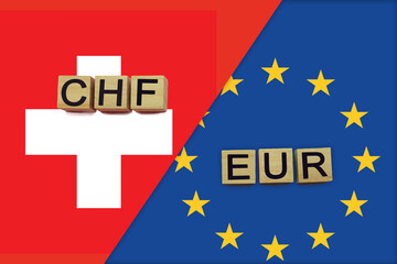 Switzerland and Europe currencies codes on national flags background