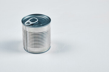 Closed tin can on a white background