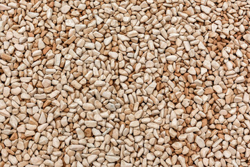 Small naturally polished gray pebbles background