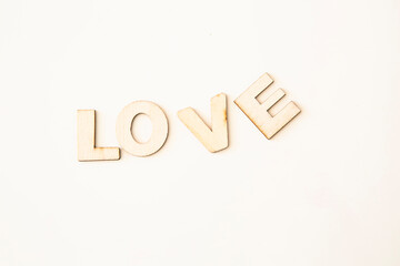 wooden letters with the word "love" written