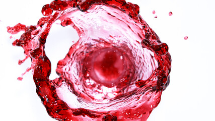 Red wine splash in vortex shape isolated on white background