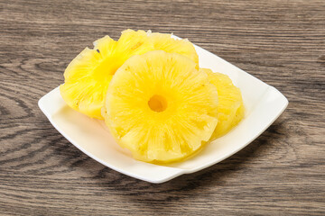 Sweet pineapple rings in the bowl