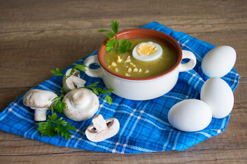 Mushroom cream soup, soup with mushrooms, champignons and egg