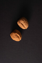 Walnuts isolated on black background