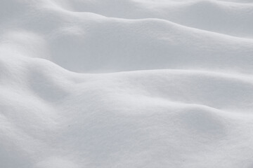 Fototapeta premium Background with white snow. Snow drifts, hills and mountains.