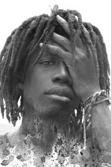 A monochrome dramatic portrait of a man