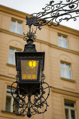 Fototapeta na wymiar Luxurious vintage black metal street lamp