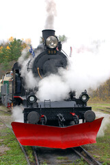 Fototapeta na wymiar Steam train with steam blasting out 