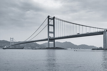 Suspension bridge to Park island. Hong Kong.