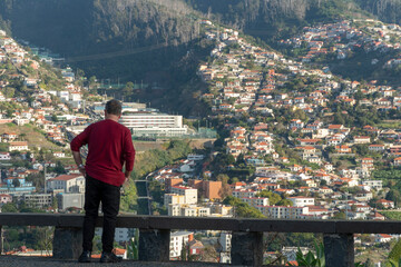 Fototapeta na wymiar Aerial view of Funchal, capital city on Madeira Island from viewpoint Pico dos barcelos lookout