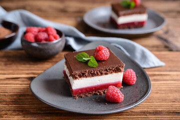 Delicious chocolate raspberry cheesecake, topped with chocolate frosting