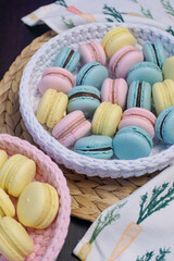 Fototapeta na wymiar Macaroon dessert gift for valentine's day. Multi-colored cookies with cream.