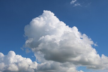 Naklejka na ściany i meble beautiful white clouds at the blue sky