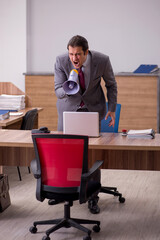 Young businessman employee in bullying concept in the office
