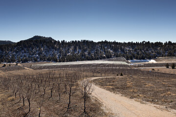 Beautiful Taurus mountains in Turkey view after the snow with farms and roads on a sunny day