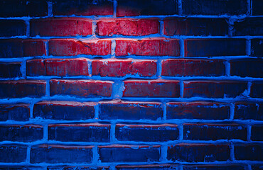 Brick wall texture background in red and blue neon lights