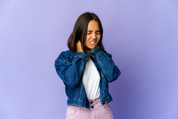 Young mixed race woman suffering neck pain due to sedentary lifestyle.