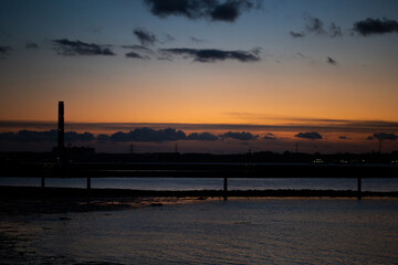 Fototapeta premium Power Station at dusk. Landmark energy production fossil fuels pollution environmental impact