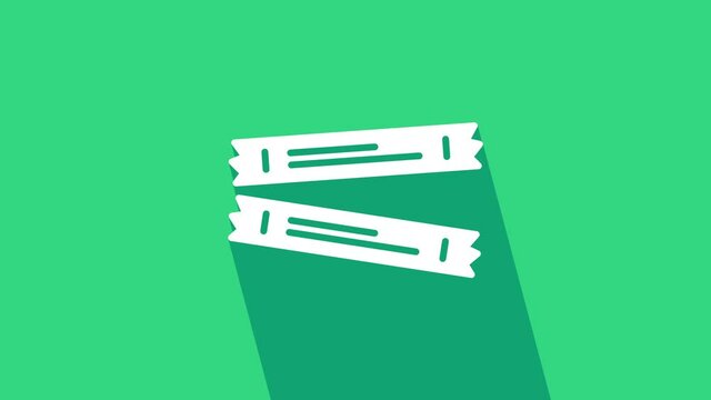 White Sugar stick packets icon isolated on green background. Blank individual package for bulk food products as coffee, salt, spices. 4K Video motion graphic animation